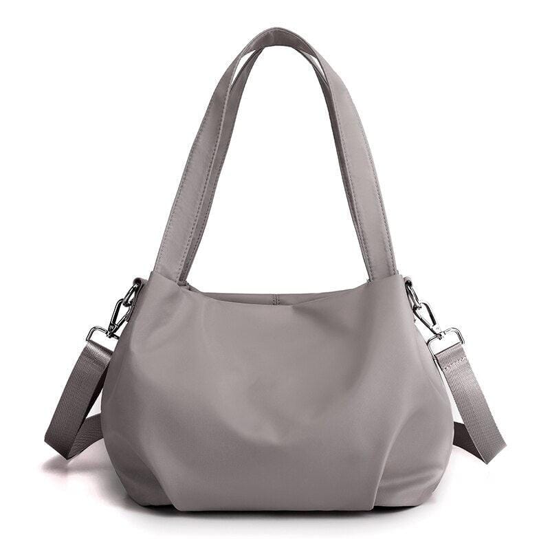 Bolsa Feminina Transversal Impermeável - BellaSling Bolsa Feminina Transversal Impermeável - BellaSling Importe Go Khaki Claro 