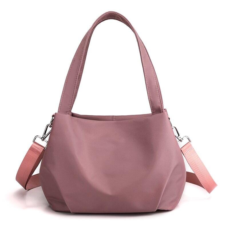 Bolsa Feminina Transversal Impermeável - BellaSling Bolsa Feminina Transversal Impermeável - BellaSling Importe Go Rosa Claro 